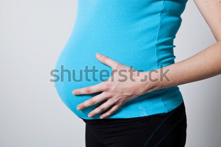 Terhes has közelkép kezek tart nő Stock fotó © ElinaManninen