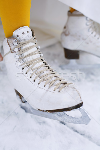 Close-up of an ice skate on a female foot. Stock photo © ElinaManninen