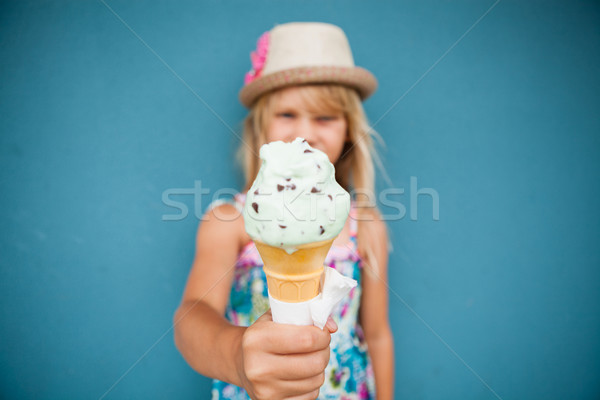Fagylalttölcsér fiatal lány közelkép fókusz vanília aranyos Stock fotó © ElinaManninen