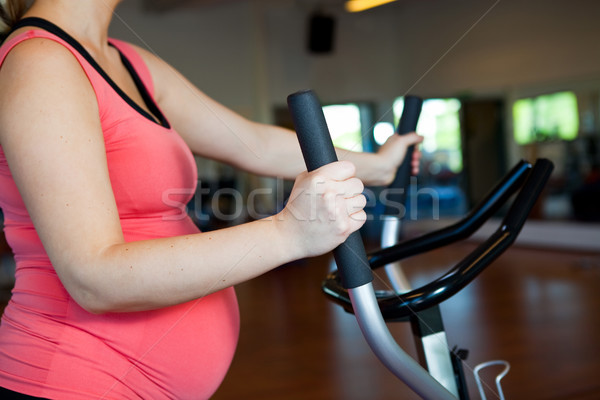 Pregnant woman doing cardiovascular exercise Stock photo © ElinaManninen