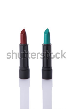 Two trendy lipsticks in brick red and teal colors  Stock photo © Elisanth
