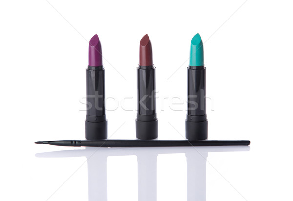 Trendy lipsticks and makeup brush   Stock photo © Elisanth