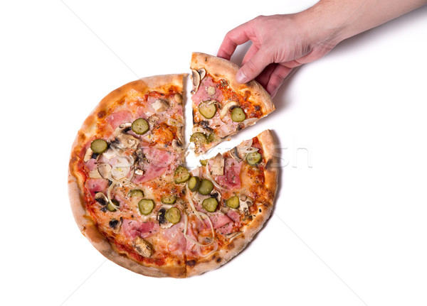 Top view of male hand picking pizza slice  Stock photo © Elisanth