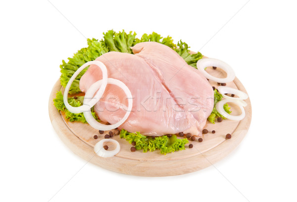 Fresh raw chicken breasts on chopping board  Stock photo © Elisanth