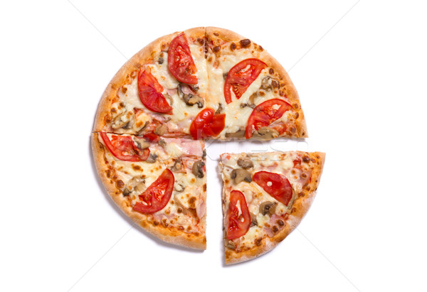 Top view of tasty Italian pizza with ham and tomatoes with a sli Stock photo © Elisanth