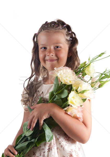 Smiling little girl with pigtail hairstyle holding flowers  Stock photo © Elisanth