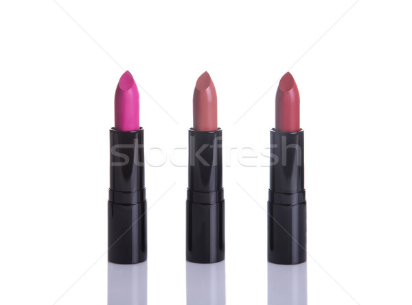 Three lipsticks in glamorous colors  Stock photo © Elisanth