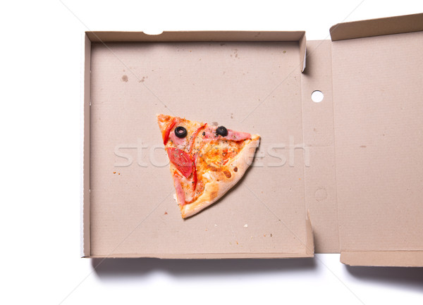 Slice of tasty pizza with ham and tomatoes in box  Stock photo © Elisanth