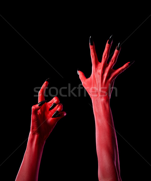 Czerwony diabeł ręce czarny paznokcie Zdjęcia stock © Elisanth