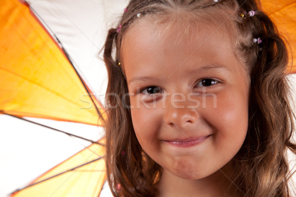 Close-up shot of cute little girl with umbrella  Stock photo © Elisanth