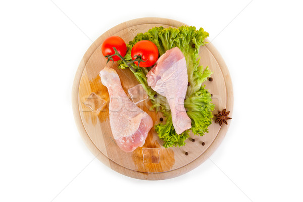 Fresh and frozen chicken legs with vegetables  Stock photo © Elisanth