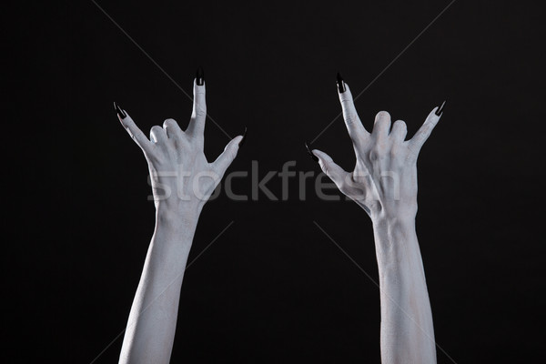 Sápadt szellem kezek mutat nehézfém felirat Stock fotó © Elisanth