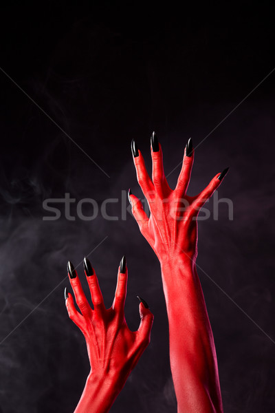 Horror czerwony diabeł ręce czarny paznokcie Zdjęcia stock © Elisanth