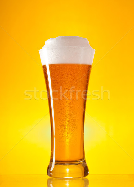 Full glass of beer with froth  Stock photo © Elisanth