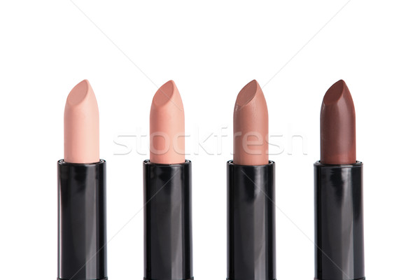 Close-up shot of four lipsticks in trendy colors  Stock photo © Elisanth