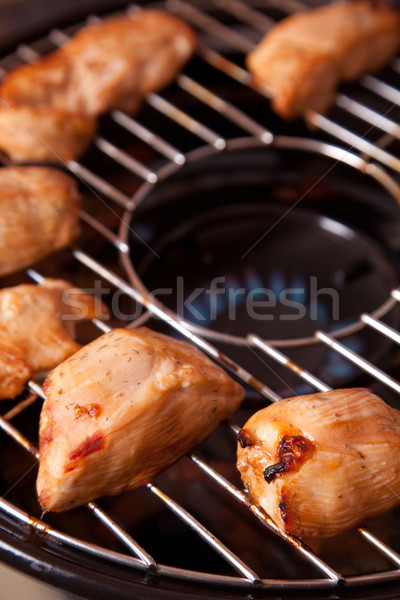 Chicken meat on gas grill  Stock photo © Elisanth