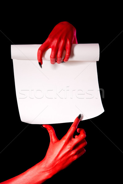 Czerwony diabeł ręce papieru przejdź wskazując Zdjęcia stock © Elisanth