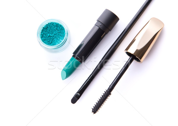 Top view of loose eye shadow, lipstick, makeup brush, and mascar Stock photo © Elisanth