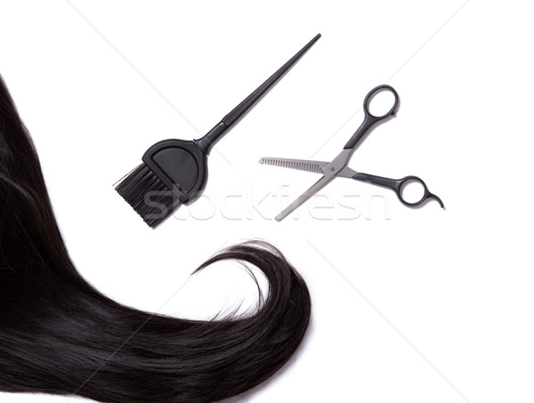 Long black shiny hair with professional scissors and hair dye br Stock photo © Elisanth