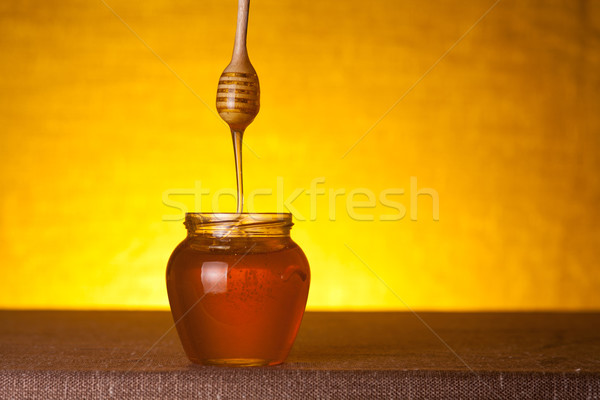 Stock photo: Honey jar 