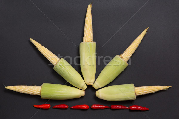 Fresh raw baby corn cobs with red chili pepper  Stock photo © Elisanth