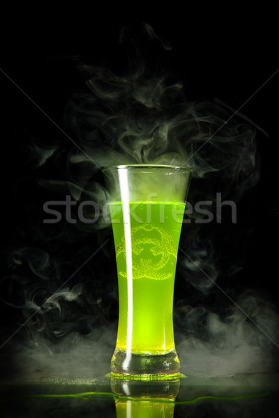 Green radioactive alcohol with biohazard symbol inside  Stock photo © Elisanth