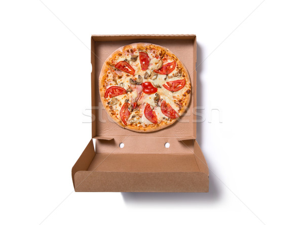 Fresh tasty Italian pizza with ham and tomatoes in box  Stock photo © Elisanth