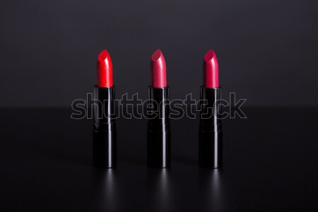 Three red trendy lipsticks  Stock photo © Elisanth