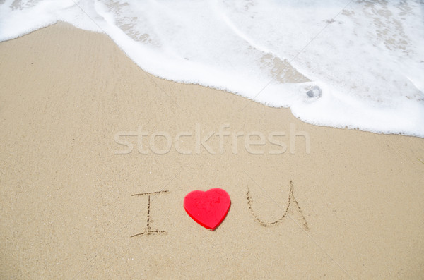 Imzalamak plaj sevmek kırmızı kalp şekli su Stok fotoğraf © EllenSmile
