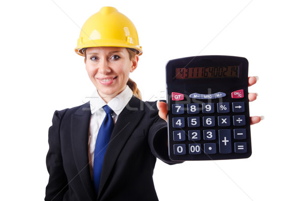 Female construction worker with calculator Stock photo © Elnur