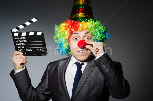 Clown with the movie board Stock photo © Elnur