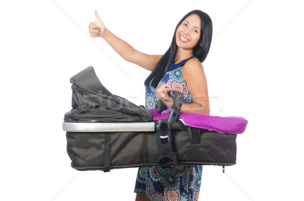 Stock photo: Happy mom with her baby in pram 
