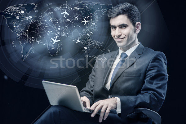 Concept of online booking with businesman and laptop Stock photo © Elnur