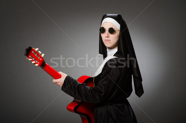 смешные монахиня красный гитаре играет музыку Сток-фото © Elnur