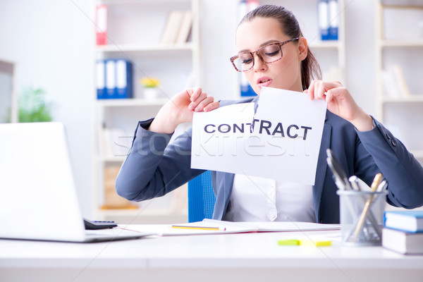 Businesswoman tearing apart her contract Stock photo © Elnur