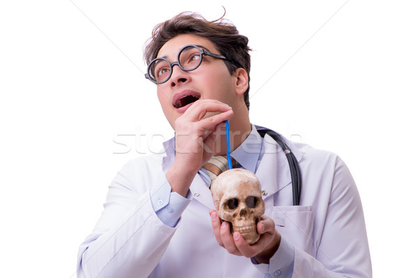 Funny doctor with skull isolated on white Stock photo © Elnur