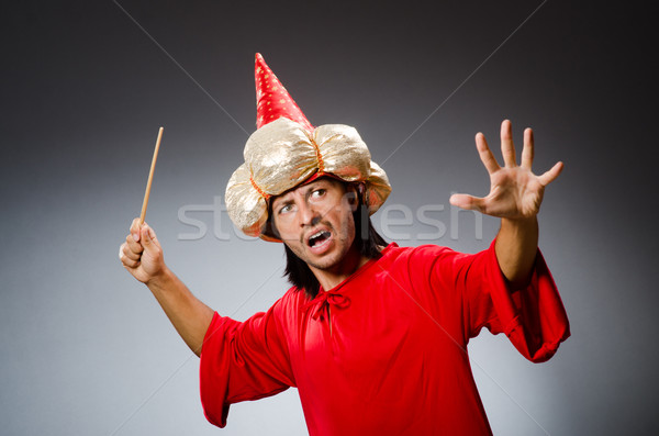 Funny wizard wearing red dress Stock photo © Elnur