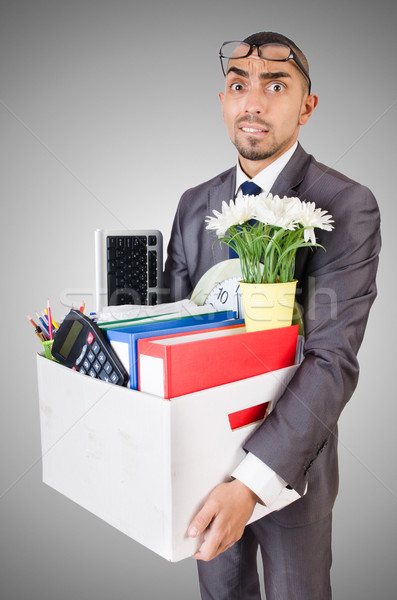 Man being fired with box of personal stuff Stock photo © Elnur