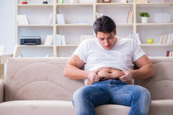 Homme souffrance supplémentaire poids régime alimentaire alimentaire [[stock_photo]] © Elnur