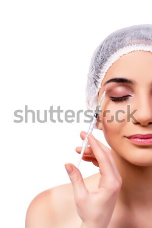 Young woman preparing for plastic surgery isolated on white Stock photo © Elnur