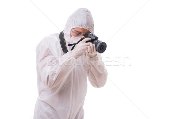 Forensic specialist in protective suit taking photos on white Stock photo © Elnur
