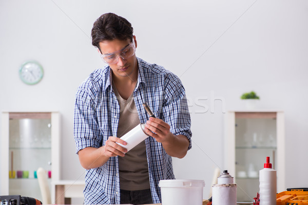 Young man in woodworking hobby concept Stock photo © Elnur