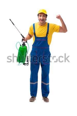 Stock photo: Young woman in green coveralls