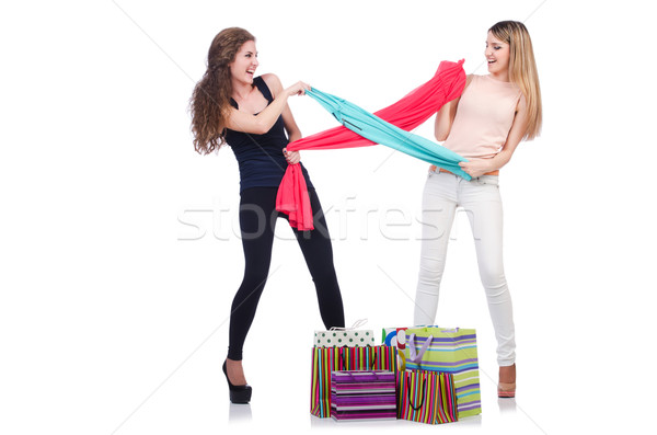 Woman trying new clothing on white Stock photo © Elnur