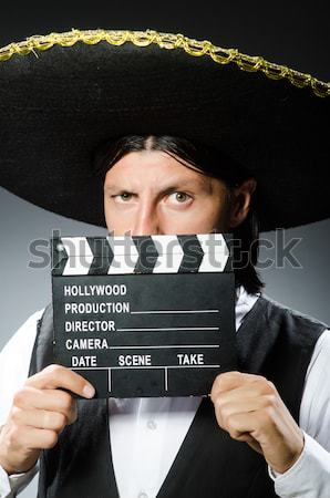 Stock photo: Inmate with movie clapper board