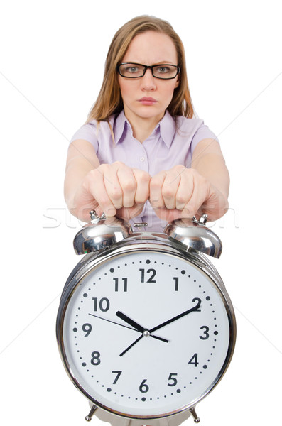 Young employee holding alarm clock isolated on white Stock photo © Elnur