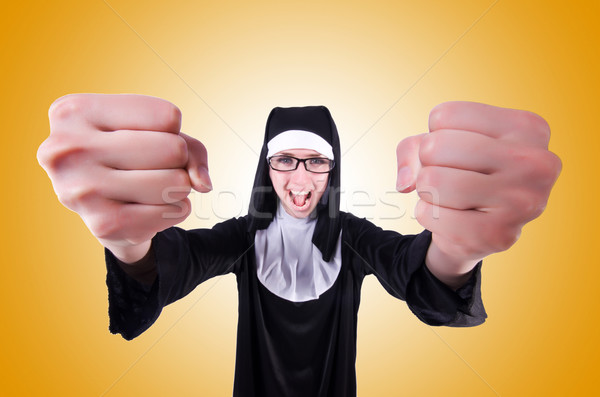 Funny nun isolated on the white background Stock photo © Elnur