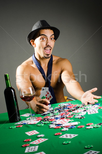 Сток-фото: человека · питьевой · играет · казино · вино · стекла