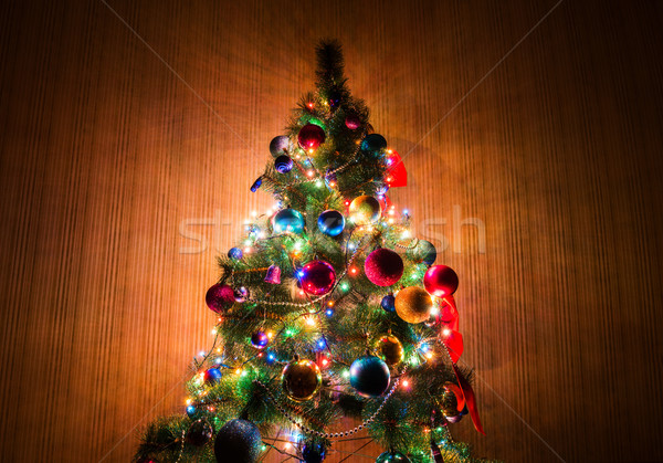 Christmas tree in dark room Stock photo © Elnur