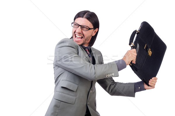 Stock photo: Young businessman in gray suit holding briefcase isolated on white